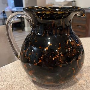 Brown Art Glass Pitcher With Tortoise Shell Markings Clear Handle vintage